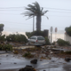 Debris blocks a road in the seafront village of Feteira, outside Horta.